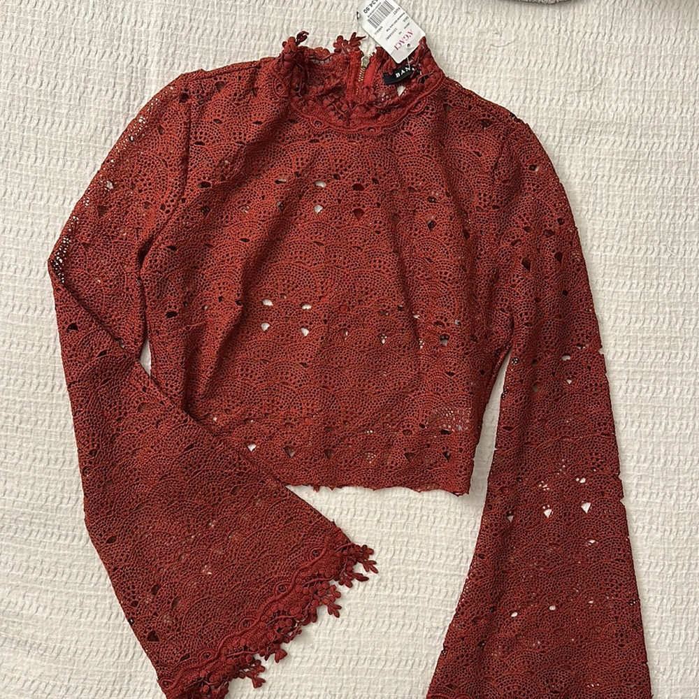 Orange knit crop top with flared sleeves (small)